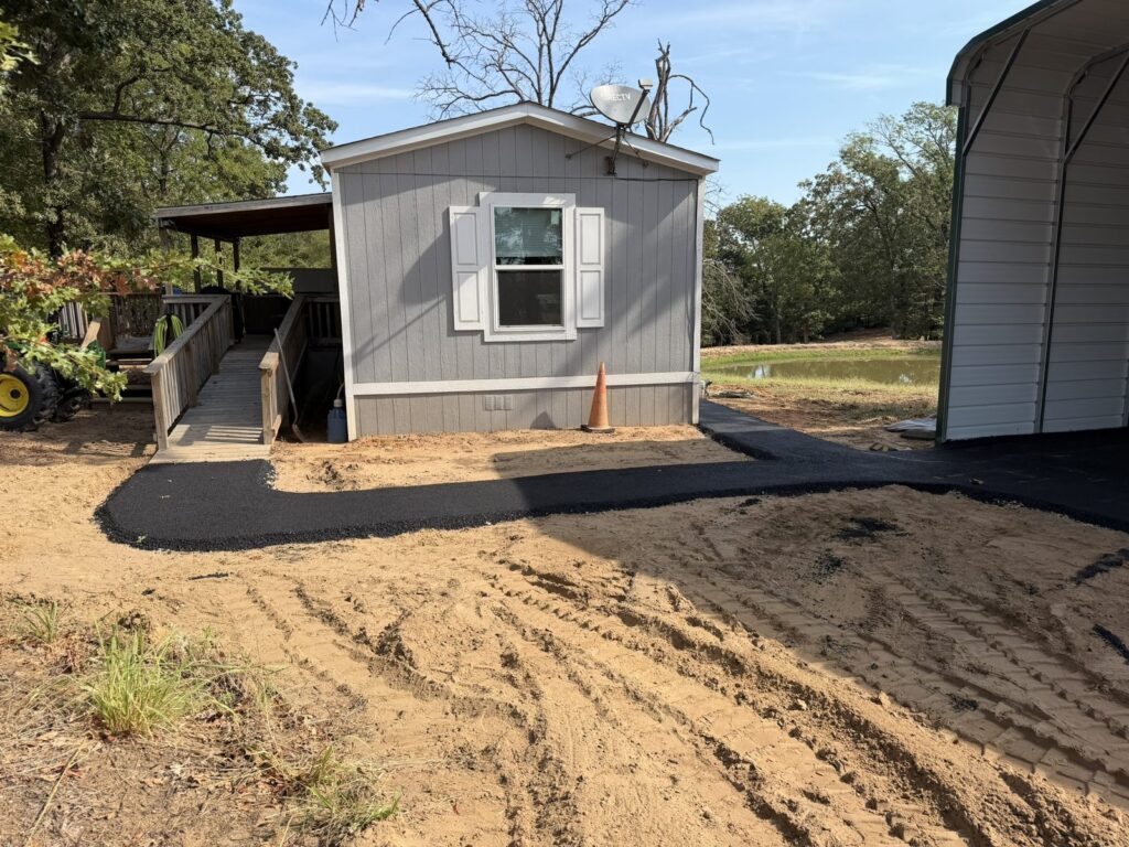New asphalt walkway to a house in Denison, TX